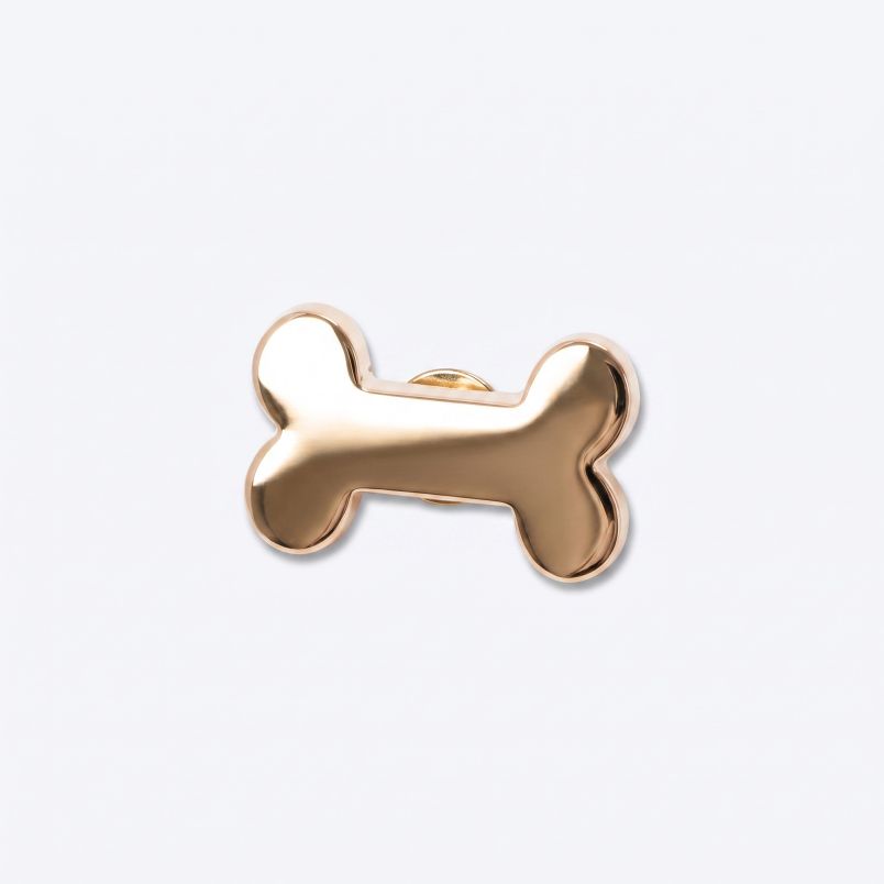 CROCS Bedž gold dog bone U - 10012309
